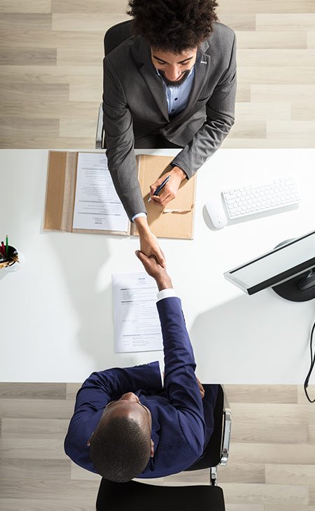 How To Successfully Negotiate Salary: +50 Tips &Amp; Strategies Independent Recruiter LLC | Staffing Agency two men negotiating and shaking hands