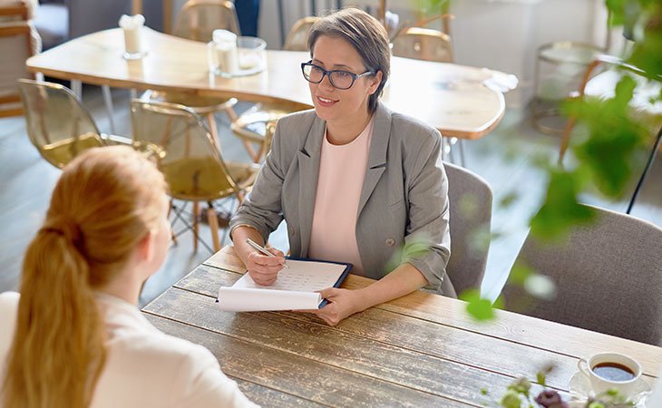 30+ Must-Ask Exit Interview Questions With Answers &Amp; Tips Independent Recruiter LLC | Staffing Agency two people in a casual job interview