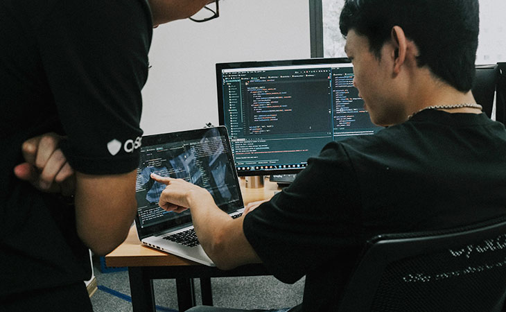 young man with computers
