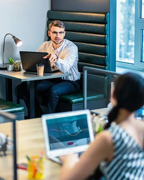 two coworkers talking