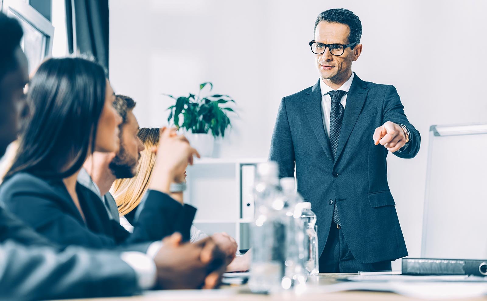 Job Description For Directors: Sample, Tips &Amp; Templates Independent Recruiter LLC | Staffing Agency director-pointing-meeting