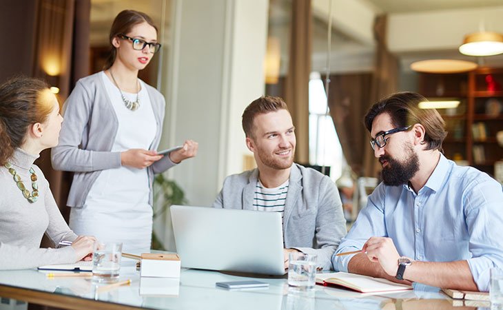 100+ Interview Questions For Product Managers + Answers Independent Recruiter LLC | Staffing Agency group-people-meeting-laptop-table