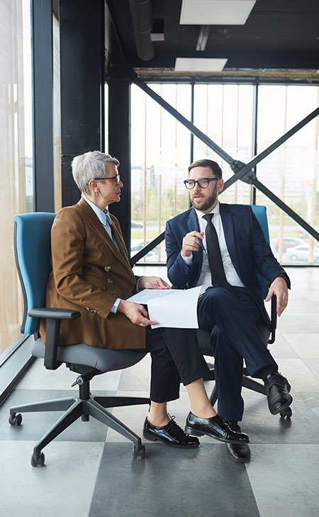 100+ Interview Questions For Managers &Amp; Interview Answers Independent Recruiter LLC | Staffing Agency man-woman-talking-chair-indoors