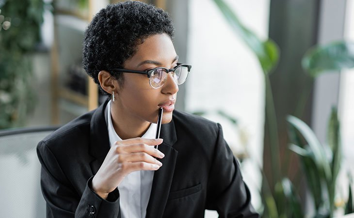 100+ Interview Questions For Product Managers + Answers Independent Recruiter LLC | Staffing Agency woman-thinking-pen-mouth