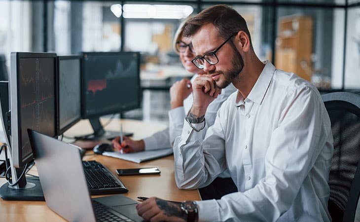 man-thinking-computer-office