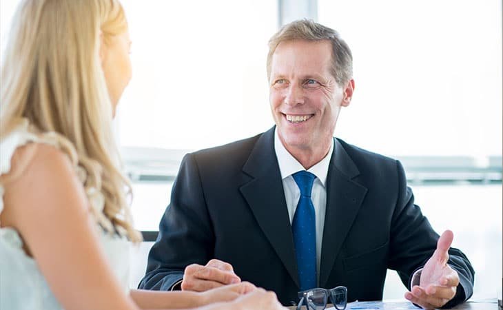 man talking to a woman