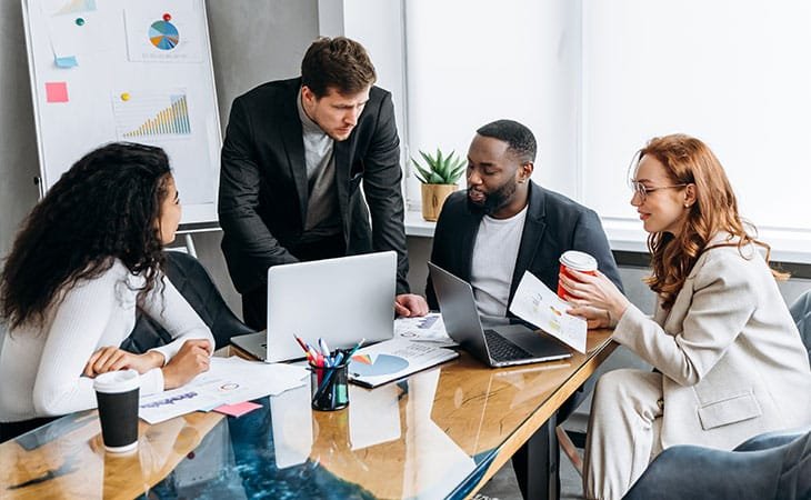people having a meeting in an office